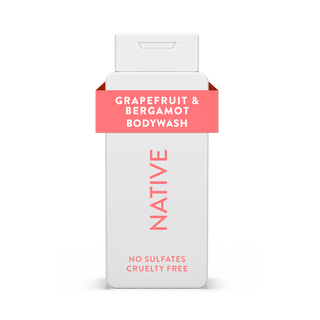 Native Grapefruit & Bergamot Body Wash bottle with white packaging and light pink text