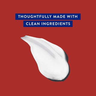Conditioner smear with text reading “Thoughtfully made with clean ingredients” on red background