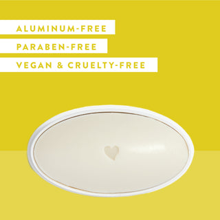 Inside of Native Honey & White Oak deodorant laid flat on yellow background