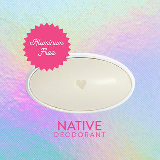 Inside of Native Piece of Cake deodorant laid flat on colorful background
